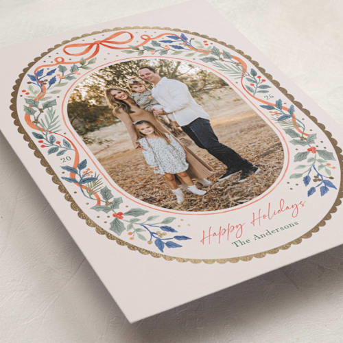 This is a holly foil pressed holiday cards with foil pressed by Elly called a gentle bow printing on recycled smooth signature in standard