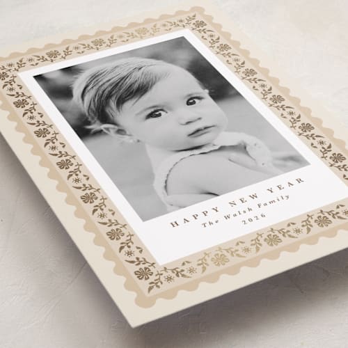 This is a eggnog foil pressed holiday cards with foil pressed by Olivia Raufman called folkloric printing on recycled smooth signature in standard