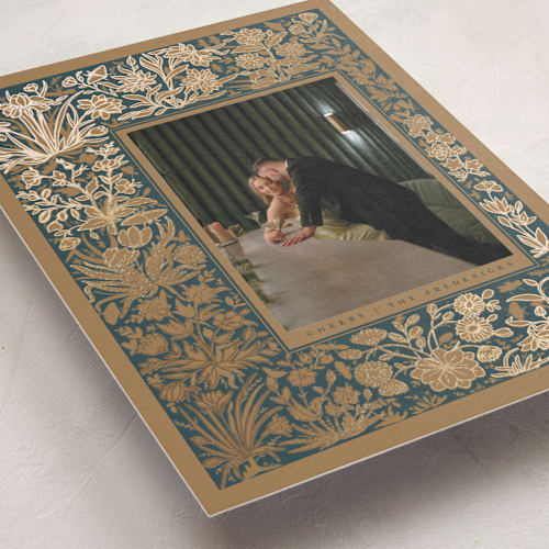 This is a caramel foil pressed holiday cards with foil pressed by Danie Romrell called diving dipper printing on recycled smooth signature in standard