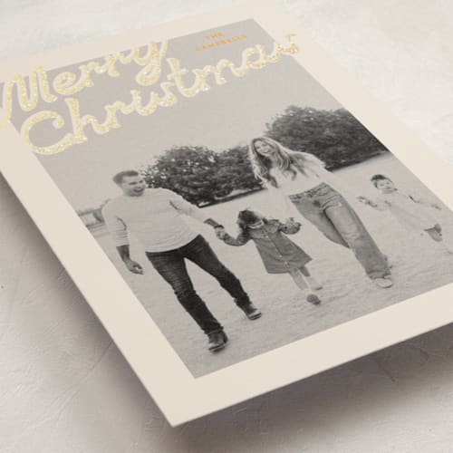 This is a butterscotch foil pressed holiday cards with foil pressed by Ekko Studio called nostalgia printing on recycled smooth signature in standard