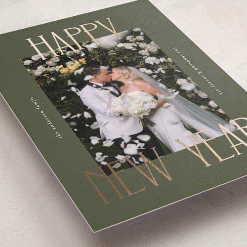 This is a juniper foil pressed holiday cards with foil pressed by Kelly Watkins called maeve printing on recycled smooth signature in standard