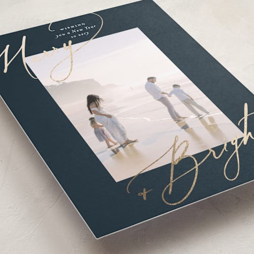 This is a night foil pressed holiday cards with foil pressed by Carolyn Nicks called bright+merry printing on recycled smooth signature in standard