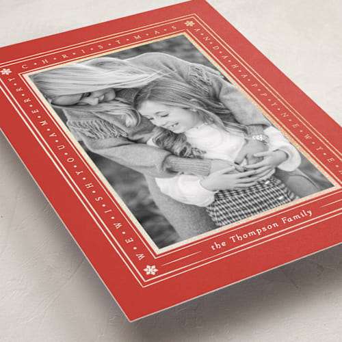 This is a holly foil pressed holiday cards with foil pressed by Robert and Stella called tiny type border printing on recycled smooth signature in standard