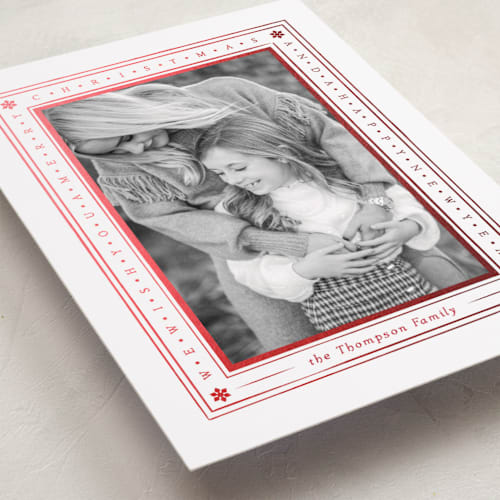 This is a snow foil pressed holiday cards with foil pressed by Robert and Stella called tiny type border printing on recycled smooth signature in standard