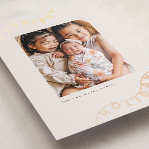 This is a ivory foil pressed holiday cards with foil pressed by Lori Wemple called string light printing on recycled smooth signature in standard