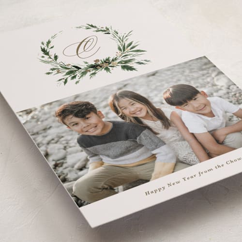This is a vintage foil pressed holiday cards with foil pressed by Kate Ahn called rustic wreath printing on recycled smooth signature in standard