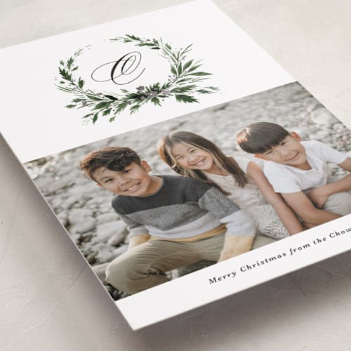 This is a snow foil pressed holiday cards with foil pressed by Kate Ahn called rustic wreath printing on recycled smooth signature in standard