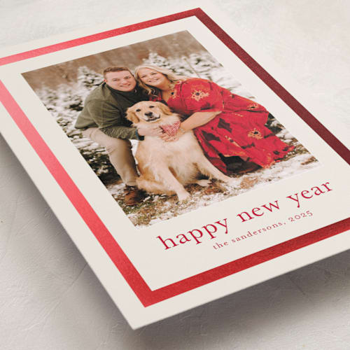This is a ivory foil pressed holiday cards with foil pressed by Stacey Meacham called modern frame printing on recycled smooth signature in standard