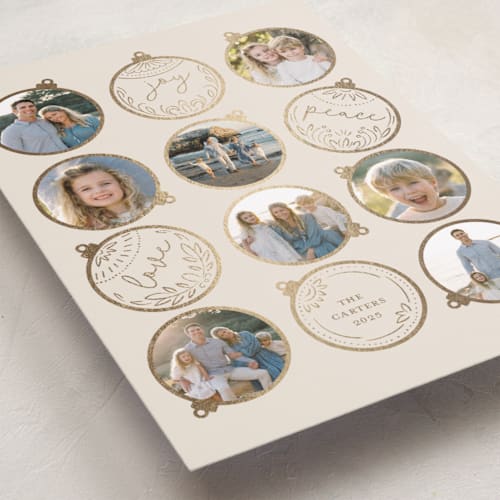 This is a clay foil pressed holiday cards with foil pressed by Teju Reval called gilded ornaments printing on recycled smooth signature in standard