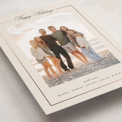 This is a vanilla foil pressed holiday cards with foil pressed by Melanie Kosuge called greenwich printing on recycled smooth signature in standard
