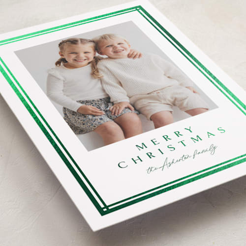 This is a pine foil pressed holiday cards with foil pressed by Lea Delaveris called trim printing on recycled smooth signature in standard