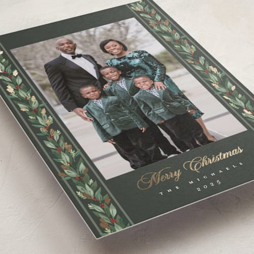 This is a juniper foil pressed holiday cards with foil pressed by Rebecca Durflinger called evergreen garlands printing on recycled smooth signature in standard