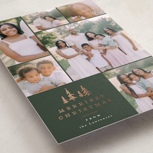 This is a forest foil pressed holiday cards with foil pressed by Everett Paper Goods called among the pines printing on recycled smooth signature in standard