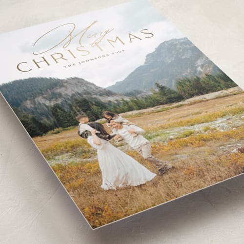 This is a champagne foil pressed holiday cards with foil pressed by Erin German called simply stated printing on recycled smooth signature in standard