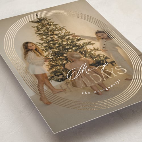 This is a buttercream foil pressed holiday cards with foil pressed by Joanna Griffin called porcelain china printing on recycled smooth signature in standard