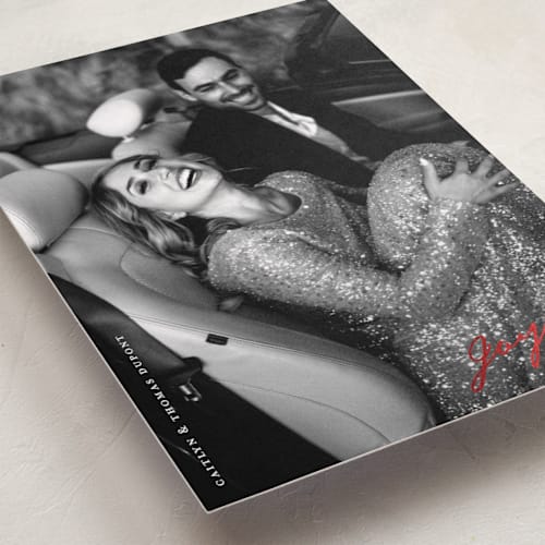 This is a snow foil pressed holiday cards with foil pressed by Christie Garcia called darling joyful printing on recycled smooth signature in standard