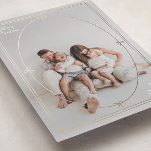 This is a sugar foil pressed holiday cards with foil pressed by Baumbirdy called bow frame printing on recycled smooth signature in standard