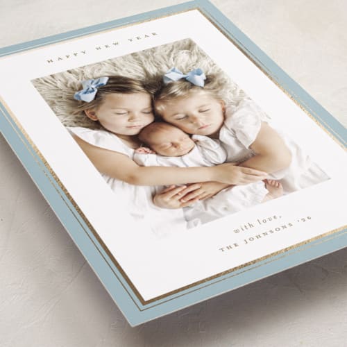 This is a sky foil pressed holiday cards with foil pressed by Christy Hy Lee called clean frame printing on recycled smooth signature in standard