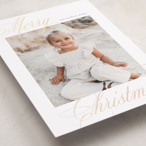 This is a ink foil pressed holiday cards with foil pressed by Nicole Walsh called merry script printing on recycled smooth signature in standard
