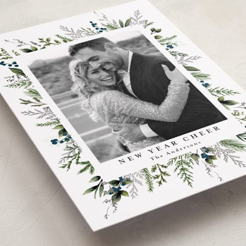 This is a winter berry foil pressed holiday cards with foil pressed by Susan Moyal called classic greenery printing on recycled smooth signature in standard