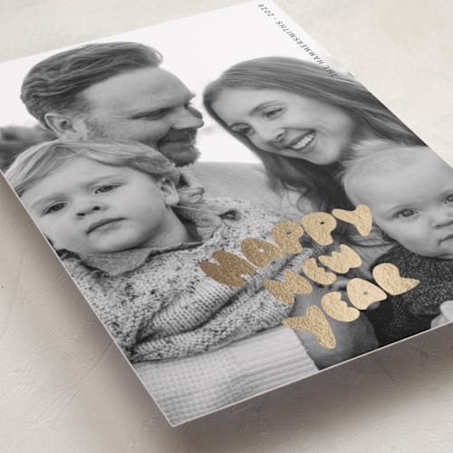 This is a coal foil pressed holiday cards with foil pressed by Claire called bubble type printing on recycled smooth signature in standard
