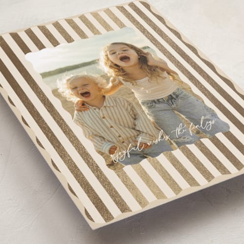 This is a vanilla foil pressed holiday cards with foil pressed by Angela Thompson called candy stripes printing on recycled smooth signature in standard