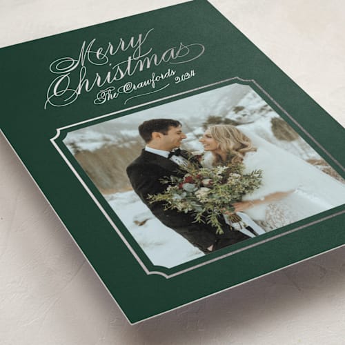 This is a evergreen foil pressed holiday cards with foil pressed by Alston Foster called silver bells printing on recycled smooth signature in standard