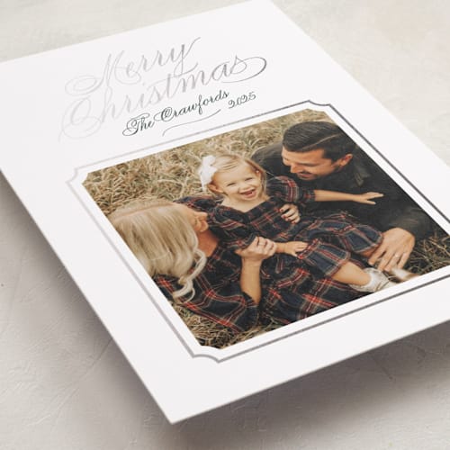 This is a marshmallow foil pressed holiday cards with foil pressed by Alston Foster called silver bells printing on recycled smooth signature in standard