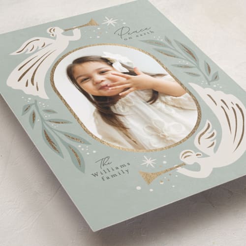This is a glacier foil pressed holiday cards with foil pressed by Karidy Walker called christmas angels printing on recycled smooth signature in standard