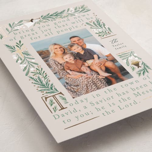 This is a ivory foil pressed holiday cards with foil pressed by Alethea and Ruth called bible story printing on recycled smooth signature in standard