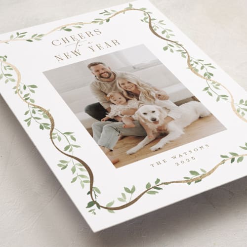 This is a snow foil pressed holiday cards with foil pressed by Everett Paper Goods called adorn framed printing on recycled smooth signature in standard