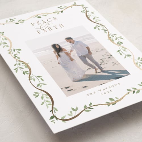 This is a snow foil pressed holiday cards with foil pressed by Everett Paper Goods called adorn framed printing on recycled smooth signature in standard