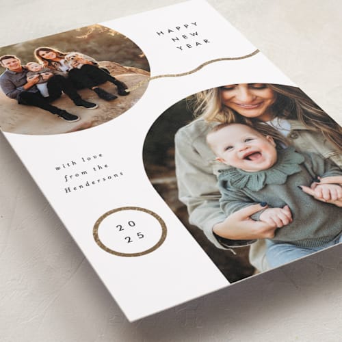 This is a snow foil pressed holiday cards with foil pressed by Everett Paper Goods called periodically printing on recycled smooth signature in standard