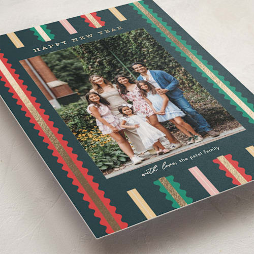 This is a confetti foil pressed holiday cards with foil pressed by Pixel and Hank called swiggle printing on recycled smooth signature in standard