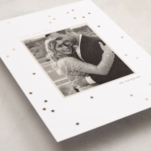 This is a cloud foil pressed holiday cards with foil pressed by Ellen Schlegelmilch called glittering stars printing on recycled smooth signature in standard