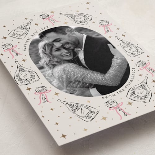 This is a peony foil pressed holiday cards with foil pressed by Jackie Crawford called champagne new year printing on recycled smooth signature in standard