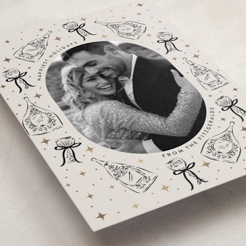 This is a noir foil pressed holiday cards with foil pressed by Jackie Crawford called champagne new year printing on recycled smooth signature in standard