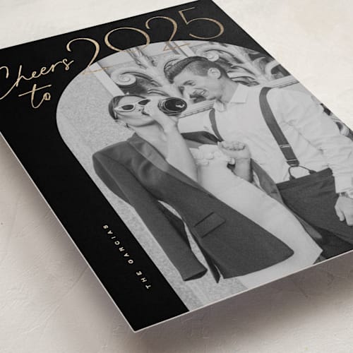 This is a coal foil pressed holiday cards with foil pressed by Creo Study called gilded cheers printing on recycled smooth signature in standard