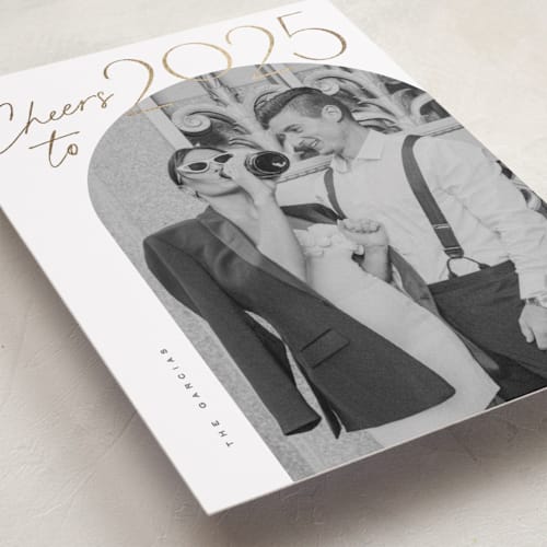 This is a ice foil pressed holiday cards with foil pressed by Creo Study called gilded cheers printing on recycled smooth signature in standard