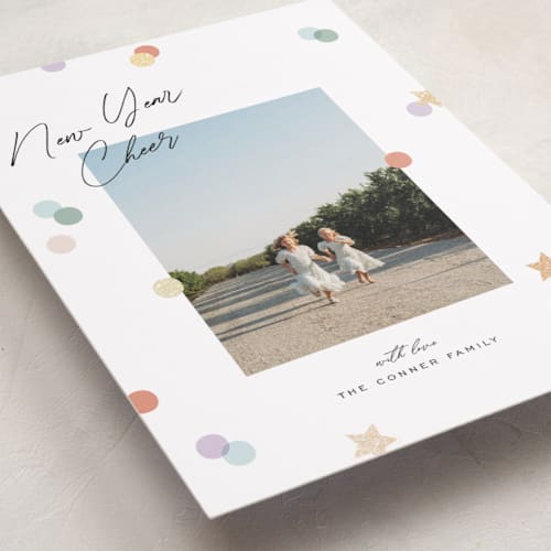 This is a confetti foil pressed holiday cards with foil pressed by Pixel and Hank called confetti cheers printing on recycled smooth signature in standard