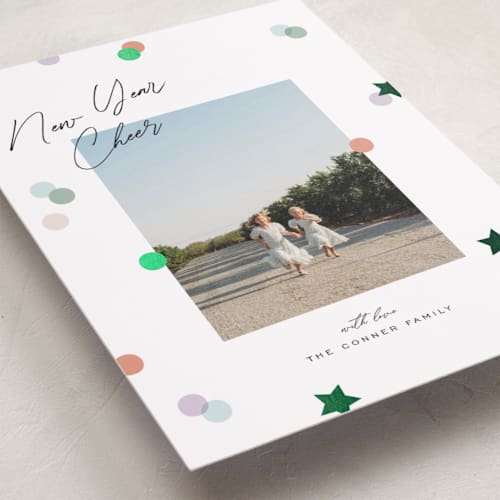 This is a confetti foil pressed holiday cards with foil pressed by Pixel and Hank called confetti cheers printing on recycled smooth signature in standard