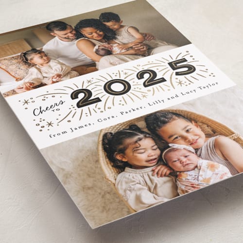 This is a noir foil pressed holiday cards with foil pressed by Alethea and Ruth called middle banner printing on recycled smooth signature in standard