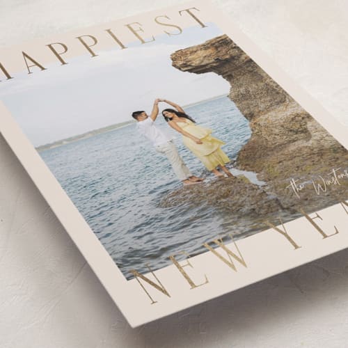This is a champagne foil pressed holiday cards with foil pressed by Ekko Studio called headlines printing on recycled smooth signature in standard