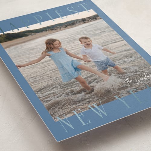 This is a glacier foil pressed holiday cards with foil pressed by Ekko Studio called headlines printing on recycled smooth signature in standard