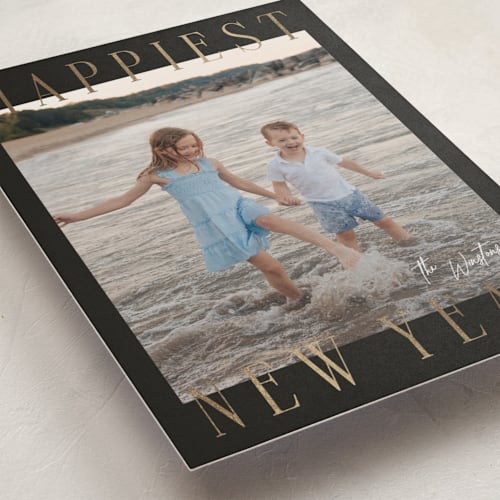 This is a midnight foil pressed holiday cards with foil pressed by Ekko Studio called headlines printing on recycled smooth signature in standard