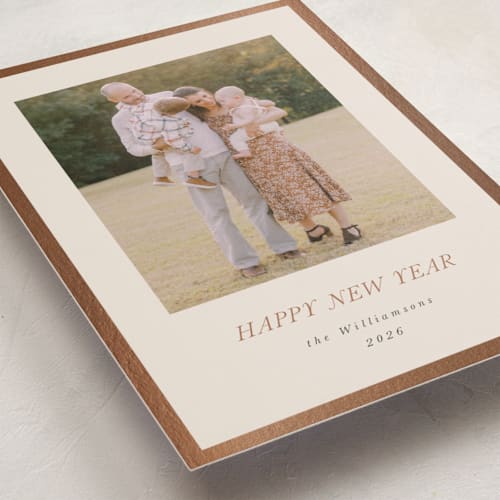 This is a eggnog foil pressed holiday cards with foil pressed by Jenna Holcomb called bordered printing on recycled smooth signature in standard