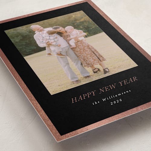 This is a midnight foil pressed holiday cards with foil pressed by Jenna Holcomb called bordered printing on recycled smooth signature in standard