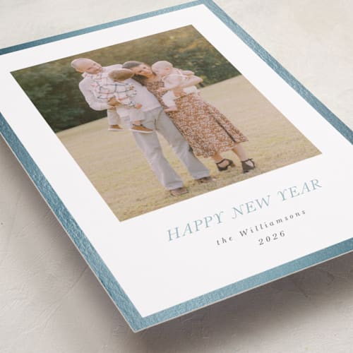 This is a icicle foil pressed holiday cards with foil pressed by Jenna Holcomb called bordered printing on recycled smooth signature in standard
