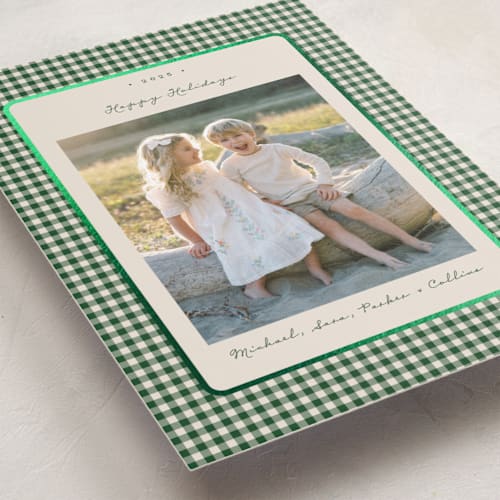 This is a fir foil pressed holiday cards with foil pressed by Emily Betts called gingham vintage printing on recycled smooth signature in standard