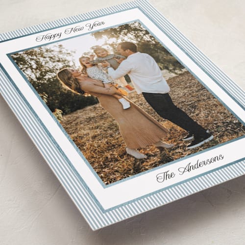 This is a pool foil pressed holiday cards with foil pressed by Annie Shapiro called little stripes printing on recycled smooth signature in standard